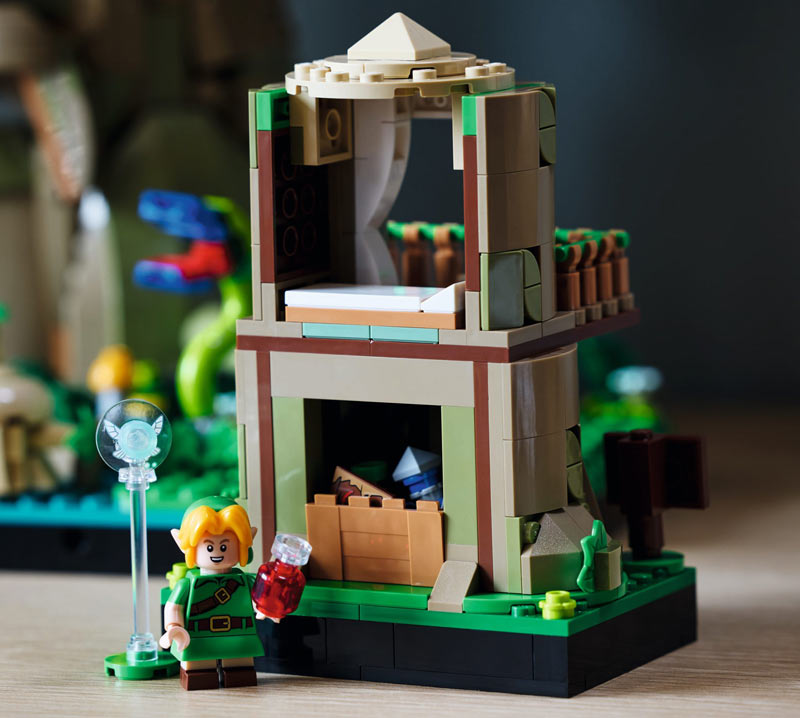 Link z Lego Zelda stojący przed domkiem